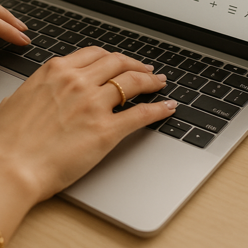 Aesthetic womens hands doing web design work, office
